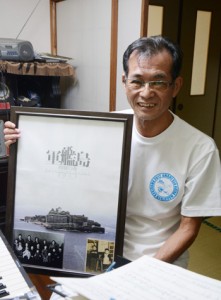 軍艦島の世界文化遺産登録を喜ぶ益田さん＝奄美市名瀬